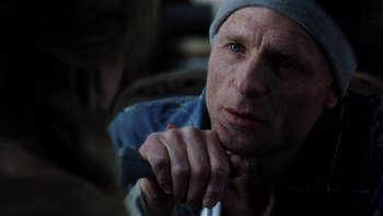 Movie still from “The Hours” (2002), directed by Stephen Daldry – A person holding a knife in his hand; Close Up shot, Over the shoulder angle