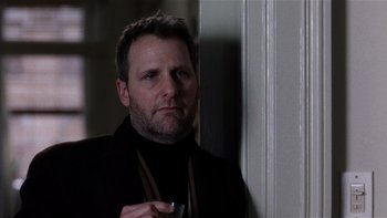 Movie still from “The Hours” (2002), directed by Stephen Daldry – A person holding a cup of coffee; Close Up shot, Over the shoulder angle