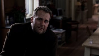 Movie still from “The Hours” (2002), directed by Stephen Daldry – A person sitting in a room; Close Up shot, Low angle