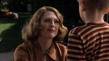 Movie still from “The Hours” (2002), directed by Stephen Daldry – A woman and a boy are talking to each other; Close Up shot, Over the shoulder angle