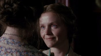 Movie still from “The Hours” (2002), directed by Stephen Daldry – A person wearing a dress; Close Up shot, Over the shoulder angle