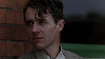 Movie still from “The Hours” (2002), directed by Stephen Daldry – A person wearing a jacket; Close Up shot, Low angle