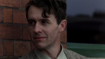 Movie still from “The Hours” (2002), directed by Stephen Daldry – A person wearing a jacket; Close Up shot, Low angle