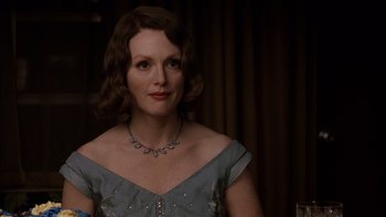 Movie still from “The Hours” (2002), directed by Stephen Daldry – A person wearing a dress; Close Up shot, Over the shoulder angle