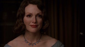 Movie still from “The Hours” (2002), directed by Stephen Daldry – A person wearing a necklace; Close Up shot, Over the shoulder angle