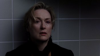Movie still from “The Hours” (2002), directed by Stephen Daldry – A person wearing a black jacket; Close Up shot, Low angle