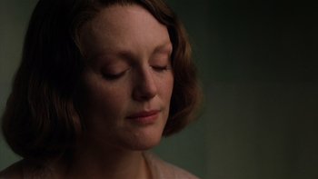 Movie still from “The Hours” (2002), directed by Stephen Daldry – A person with her eyes closed; Close Up shot, Over the shoulder angle