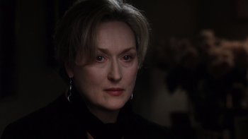 Movie still from “The Hours” (2002), directed by Stephen Daldry – A person with short hair; Close Up shot, Over the shoulder angle