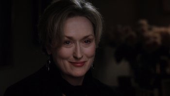 Movie still from “The Hours” (2002), directed by Stephen Daldry – A person wearing a black shirt; Close Up shot, Over the shoulder angle