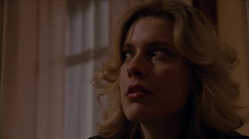 Movie still from “The House of the Devil” (2009), directed by Ti West – A person looking up at the sky; Close Up shot, Low angle