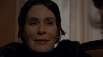 Movie still from “The House of the Devil” (2009), directed by Ti West – A person wearing a fur coat; Close Up shot, Low angle