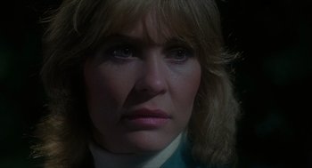 Movie still from “The Howling” (1981), directed by Joe Dante – A woman's face in the dark; Close Up shot, Low angle