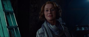 Movie still from “The Hundred-Foot Journey” (2014), directed by Lasse Hallström – A person with short hair wearing a scarf; Close Up shot, Low angle