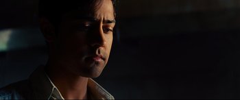 Movie still from “The Hundred-Foot Journey” (2014), directed by Lasse Hallström – A man's face in the dark; Close Up shot, Low angle