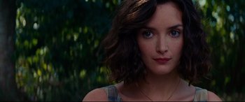 Movie still from “The Hundred-Foot Journey” (2014), directed by Lasse Hallström – A person with short brown hair; Close Up shot, Over the shoulder angle