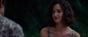 Movie still from “The Hundred-Foot Journey” (2014), directed by Lasse Hallström – A person wearing a necklace; Close Up shot, Over the shoulder angle