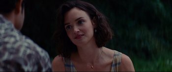 Movie still from “The Hundred-Foot Journey” (2014), directed by Lasse Hallström – A person wearing a necklace; Close Up shot, Over the shoulder angle