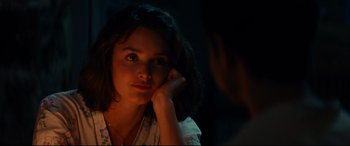 Movie still from “The Hundred-Foot Journey” (2014), directed by Lasse Hallström – A woman sitting in front of a mirror with her hand on her face; Close Up shot, Over the shoulder angle