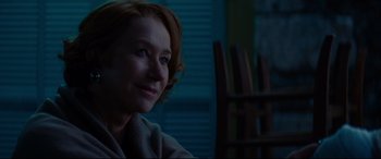 Movie still from “The Hundred-Foot Journey” (2014), directed by Lasse Hallström – A person sitting in a chair; Close Up shot, Over the shoulder angle