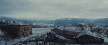 Movie still from “The Hundred-Foot Journey” (2014), directed by Lasse Hallström – A view of a snowy landscape from a hill; Extreme Wide shot, High angle