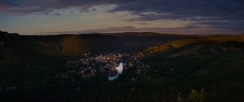 Movie still from “The Hundred-Foot Journey” (2014), directed by Lasse Hallström – A view of a town at night from a hill; Extreme Wide shot, High angle