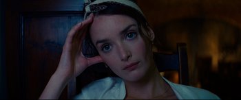 Movie still from “The Hundred-Foot Journey” (2014), directed by Lasse Hallström – A person wearing a hat; Close Up shot, High angle