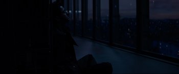 Movie still from “The Hundred-Foot Journey” (2014), directed by Lasse Hallström – A man sitting in front of a window at night; Medium shot, High angle