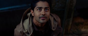 Movie still from “The Hundred-Foot Journey” (2014), directed by Lasse Hallström – A person wearing a jacket; Close Up shot, Overhead angle