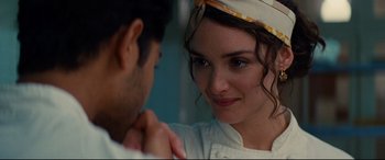 Movie still from “The Hundred-Foot Journey” (2014), directed by Lasse Hallström – A man and a woman looking at one another; Close Up shot, Over the shoulder angle