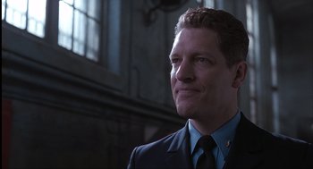 Movie still from “The Hurricane” (1999), directed by Norman Jewison – A person wearing a suit and tie; Close Up shot, Low angle