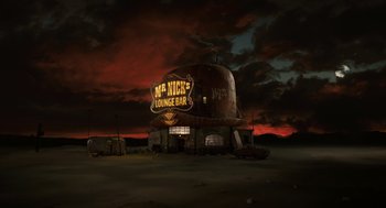 Movie still from “The Imaginarium of Doctor Parnassus” (2009), directed by Terry Gilliam – An old building in the middle of a deserted area; Extreme Wide shot, High angle