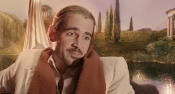 Movie still from “The Imaginarium of Doctor Parnassus” (2009), directed by Terry Gilliam – A man with a beard and a scarf around his neck; Close Up shot, Over the shoulder angle