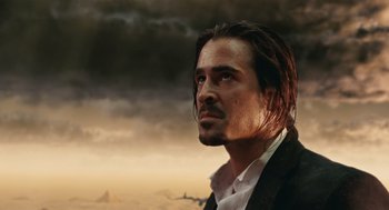 Movie still from “The Imaginarium of Doctor Parnassus” (2009), directed by Terry Gilliam – A person wearing a suit and tie; Close Up shot, Low angle