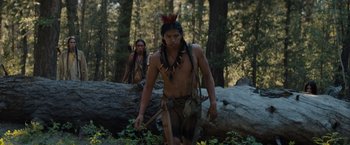 Movie still from “Prey” (2022), directed by Dan Trachtenberg – Medium shot, Low angle