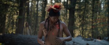 Movie still from “Prey” (2022), directed by Dan Trachtenberg – Medium shot, Low angle