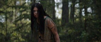 Movie still from “Prey” (2022), directed by Dan Trachtenberg – Close Up shot, Over the shoulder angle