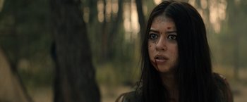 Movie still from “Prey” (2022), directed by Dan Trachtenberg – Close Up shot, Over the shoulder angle