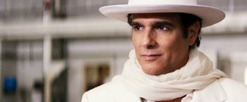 Movie still from “The Infiltrator” (2016), directed by Brad Furman – A person wearing a white hat; Close Up shot, Low angle