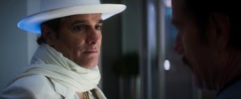 Movie still from “The Infiltrator” (2016), directed by Brad Furman – A person wearing a white hat; Close Up shot, Low angle