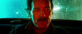 Movie still from “The Infiltrator” (2016), directed by Brad Furman – A person with a beard and mustache; Close Up shot, Low angle