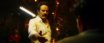 Movie still from “The Infiltrator” (2016), directed by Brad Furman – A man in a white shirt is holding out his hand; Close Up shot, Low angle