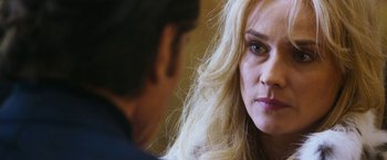 Movie still from “The Infiltrator” (2016), directed by Brad Furman – A man and a woman talking to each other; Close Up shot, Over the shoulder angle