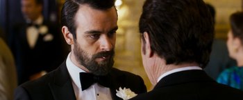 Movie still from “The Infiltrator” (2016), directed by Brad Furman – Two men in tuxedos talking to each other; Close Up shot, Over the shoulder angle