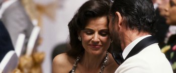 Movie still from “The Infiltrator” (2016), directed by Brad Furman – A person wearing a necklace; Close Up shot, Over the shoulder angle