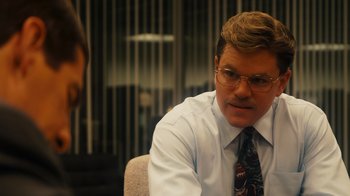 Movie still from “The Informant!” (2009), directed by Steven Soderbergh – A man in a white dress shirt and a tie; Close Up shot, Over the shoulder angle