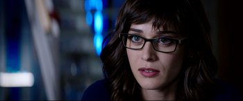 Movie still from “The Interview” (2014), directed by Evan Goldberg – A person wearing glasses; Close Up shot, Over the shoulder angle