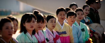 Movie still from “The Interview” (2014), directed by Evan Goldberg – A group of young women standing next to each other; Medium shot, High angle