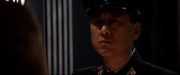 Movie still from “The Interview” (2014), directed by Evan Goldberg – A person wearing a uniform; Close Up shot, Low angle