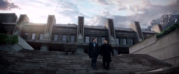 Movie still from “The Interview” (2014), directed by Evan Goldberg – Two men are walking down the steps of a building; Extreme Wide shot, Low angle
