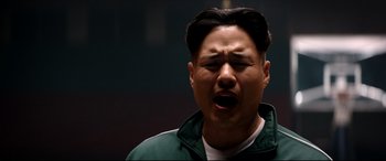Movie still from “The Interview” (2014), directed by Evan Goldberg – A man in a green and white jacket with his mouth wide open; Close Up shot, Low angle